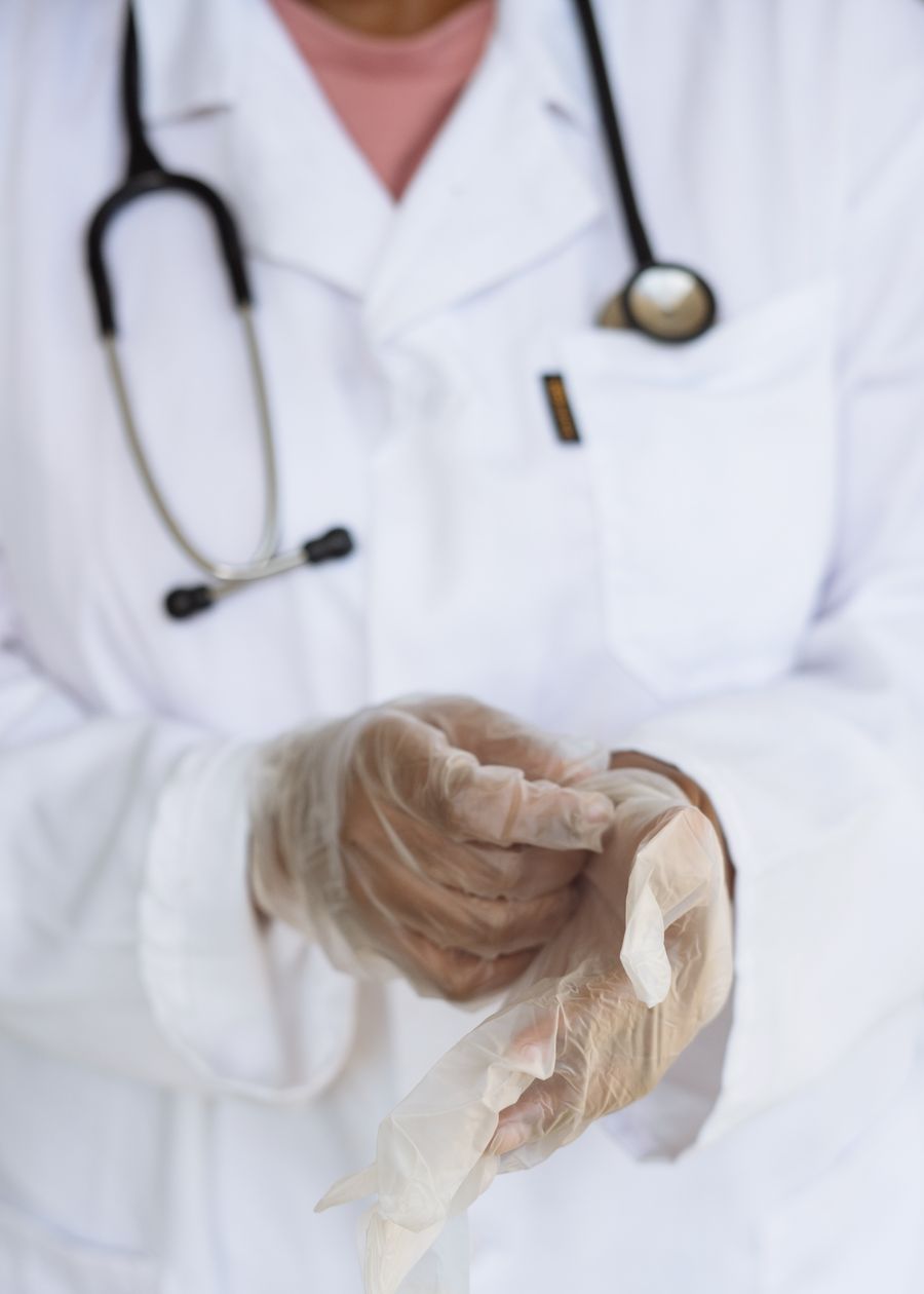 Healthcare professionals in a regulated clinical environment